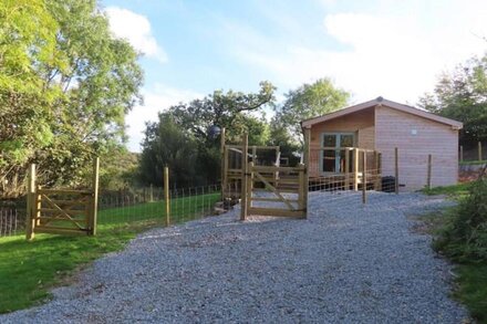 A secluded log cabin lodge with stunning views.