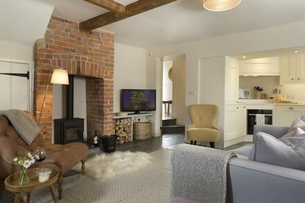 A charming cottage newly refurbished to provide a comfortable living space.