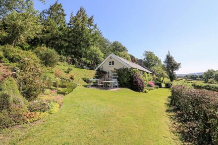 DOLGENAU HIR - THE BARN, pet friendly, with open fire in Trefeglwys