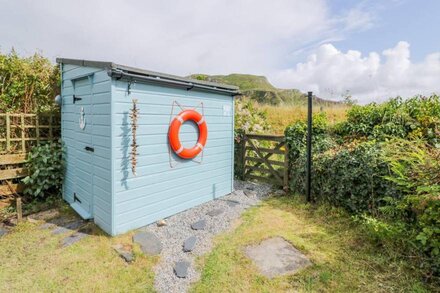 GREBE COTTAGE, pet friendly, with open fire in Balvicar, Isle Of Seil