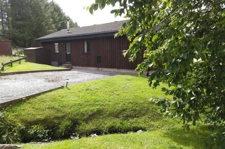 Lake District  lodge near Greystoke with woodburner, open views and stream.