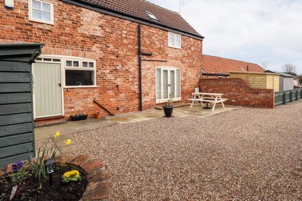 HOLLY BARN, pet friendly, with a garden in Ottringham