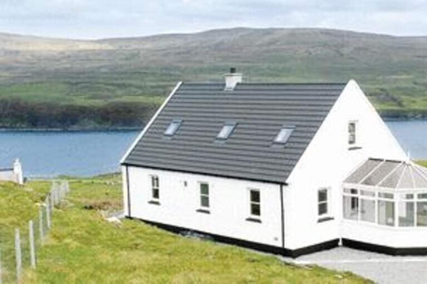 Beautiful Cottage set in natural croft land. Near to Neist Point light house.