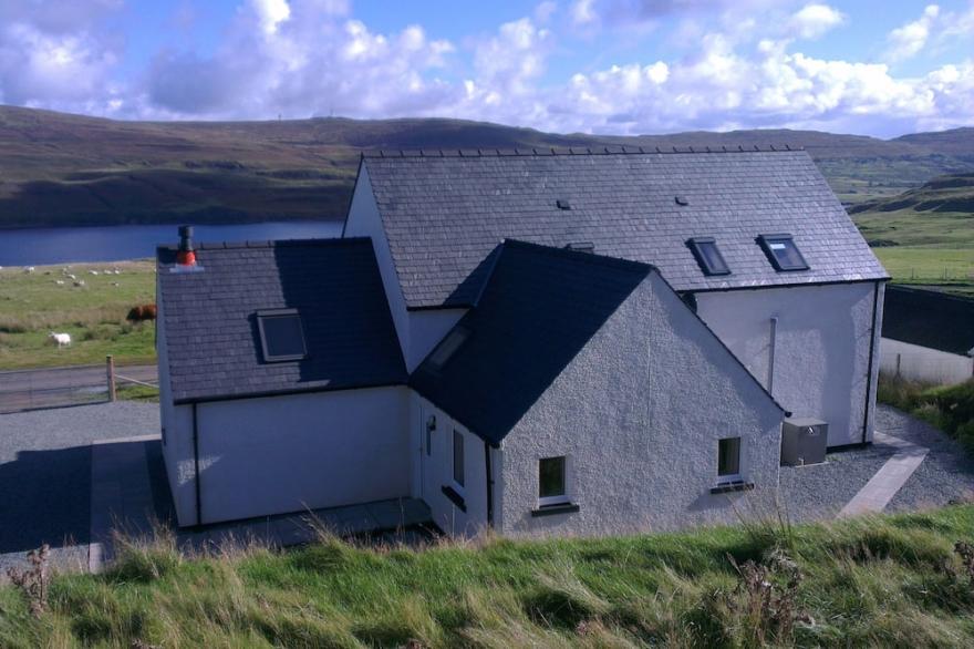 Lovely cottage with views of loch. Near to Neist Point light house.