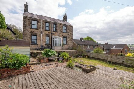 A stunning rustic period house full of period features with amazing views of Riber castle and the...