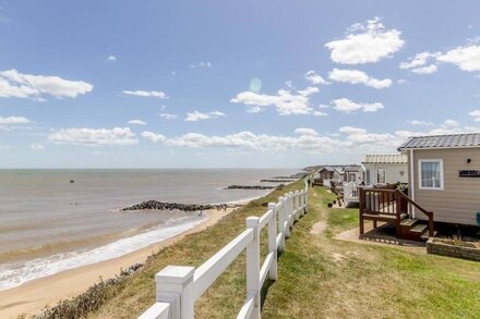 Luxury caravan boasting full sea views at Hopton Holiday Park ref 80041S