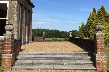 A magnificent Georgian Country Mansion in a delightful parkland setting