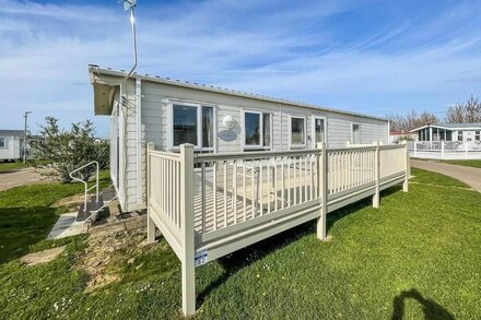 Beautiful caravan with decking at California Cliffs in Scratby ref 50052L