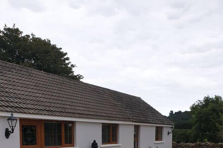 Traditional Irish cottage with views of Slieve Patrick