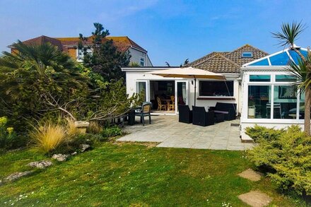 Spacious bungalow very near the beach with large garden