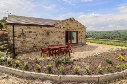 MOORBOTTOM STABLES, with a garden in Barkisland