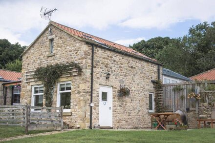 Once the old calf-house, this charming semi-detached traditional Yorkshire stone barn conversion is