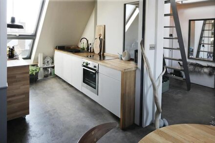 Contemporary loft style apartment. Private escape. Private parking.