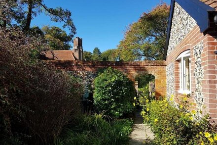 Country house in the walled garden of historic West Stow Hall