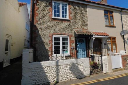 Cockleshell Cottage  - superb, traditional flint cottage in an enviable position yards from the sea.