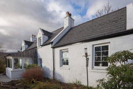 Beautiful Skye Crofter's Cottage sleeps six close to mountains, sea and beach