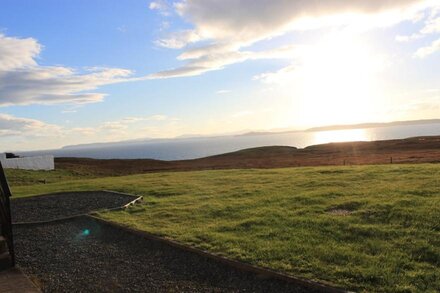 Large bungalow with spectacular views over Stornoway, the Minch and mainland.