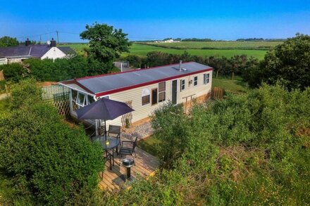 Helyg Bach chalet nestled on the tip of the beautiful Llyn Peninsula