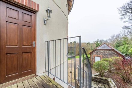 The Roundhouse has an unusual design and stands alone overlooking the lakes.