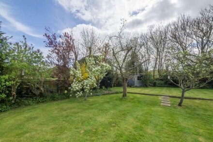 A spacious bungalow with a lovely south facing enclosed dog-friendly garden