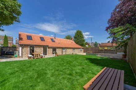 A meticulous and luxury single storey barn conversion, set in a peaceful village