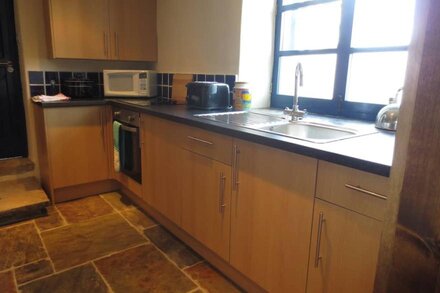 Cottage With Views Over the Peak Forest Canal and Kinder Scout.