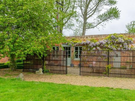 This gorgeous retreat is tucked into the walled garden on the Fring Estate.