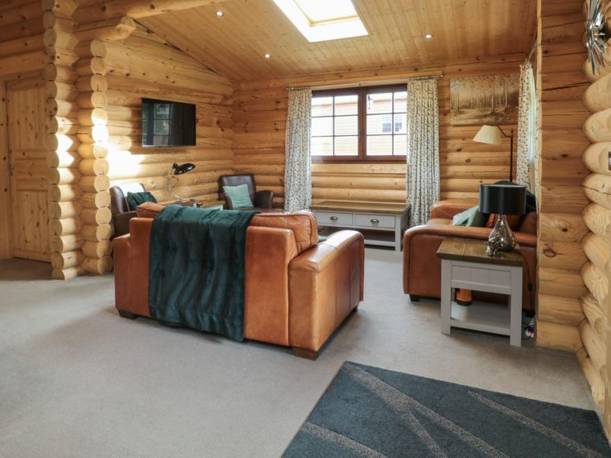 Welcome Hjem Log Cabin