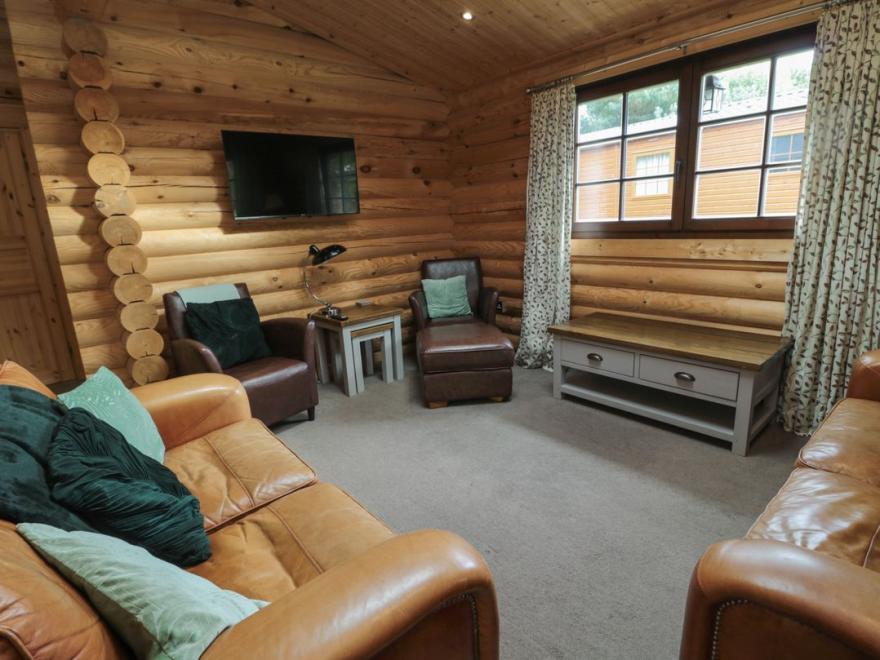 Welcome Hjem Log Cabin