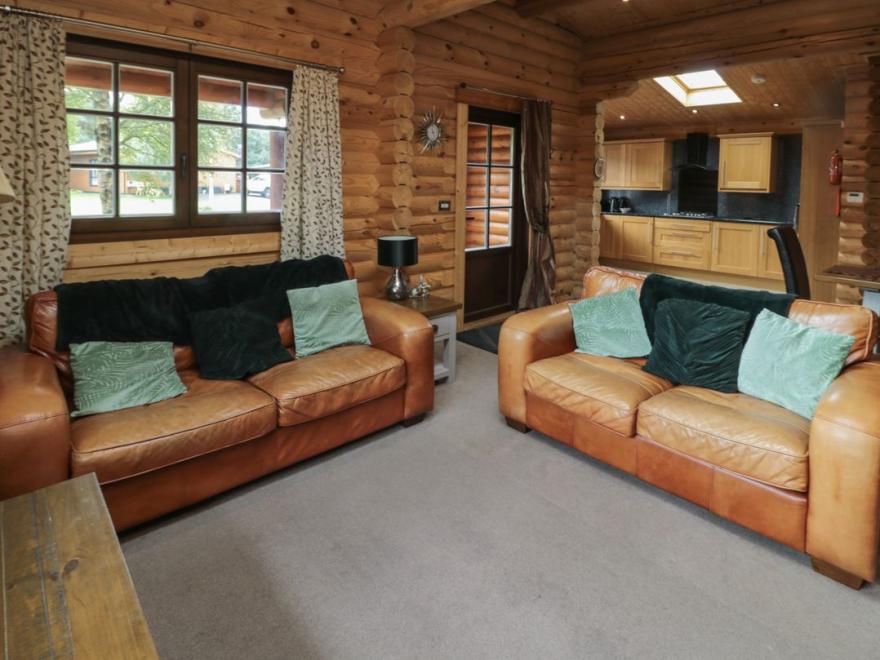 Welcome Hjem Log Cabin