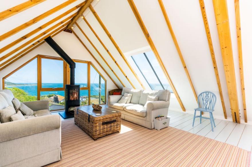 A beautiful and well designed ‘upside-down’ house with panoramic sea views.