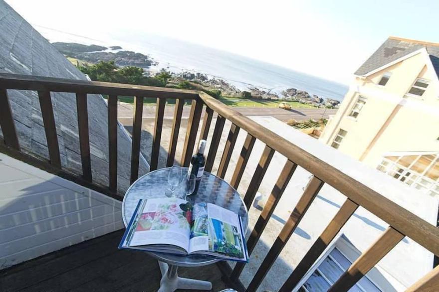 A  2-bedroom seafront apartment in a large detached property on seafront