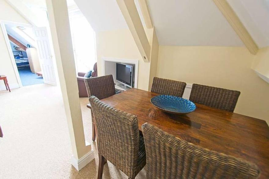 A  2-bedroom seafront apartment in a large detached property on seafront