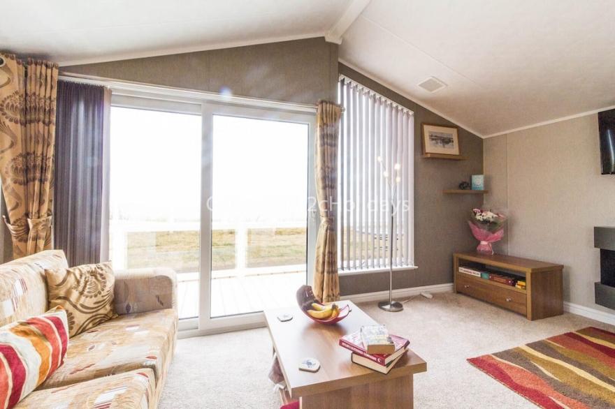 Luxury lodge with stunning sea views at Hopton Haven Park ref 80055S