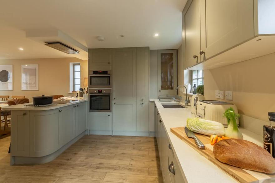 Elegant double fronted village house styled with uber relaxing interiors