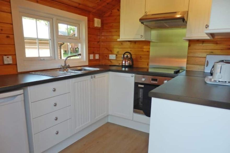 Cozy  Norwegian log cabin in Snowdonia on Trawsfynydd Holiday Village