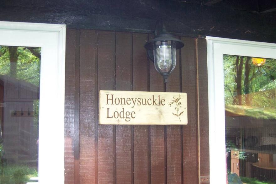 Honeysuckle Lodge set in a Beautiful 24 acre Woodland Holiday Park