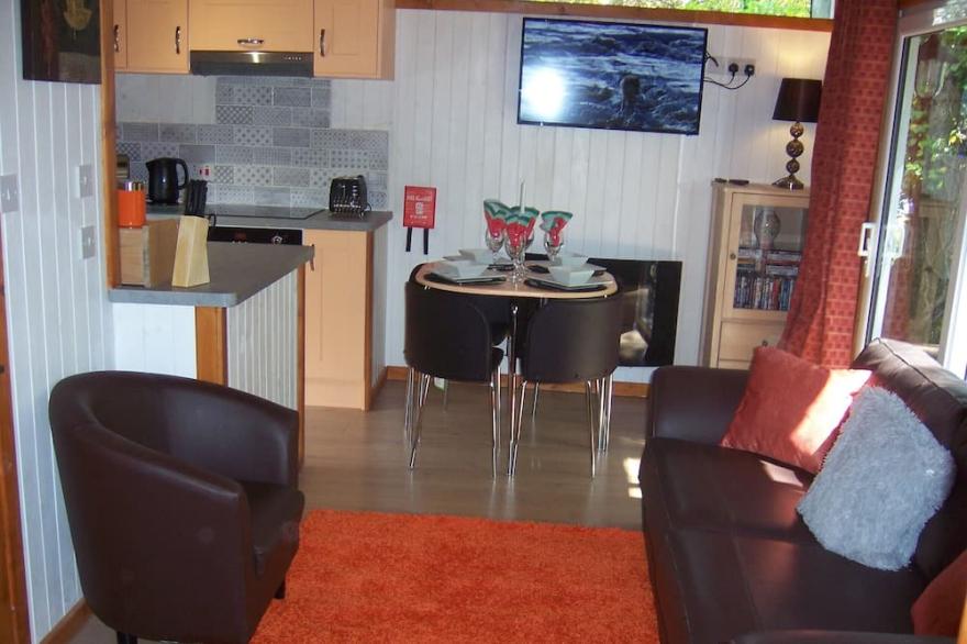 Honeysuckle Lodge set in a Beautiful 24 acre Woodland Holiday Park