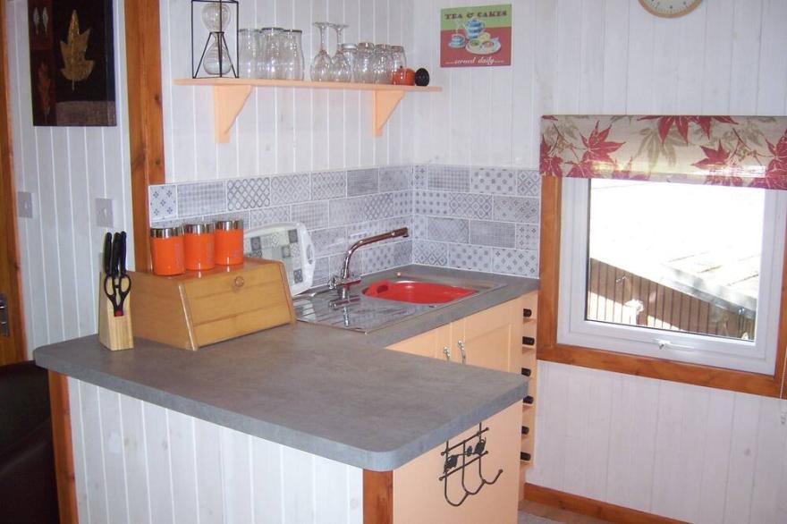 Honeysuckle Lodge set in a Beautiful 24 acre Woodland Holiday Park