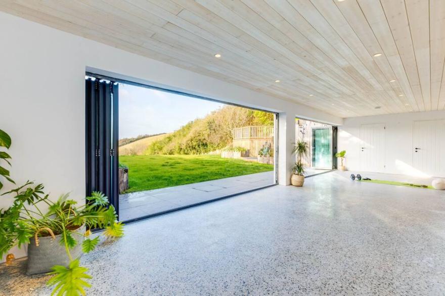 Watersend House located 500m from the majestic Watergate Bay. Set in an acre of private landscaped g