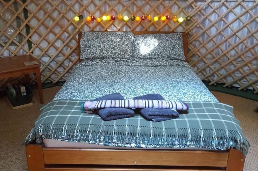 Magical Woodland Yurt with stunning mountain and estuary views