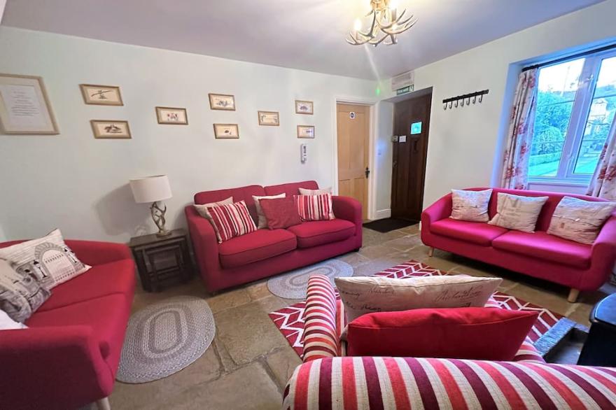 Roseleigh Cottage in the heart of Stow-on-the-Wold with parking for 2 cars.