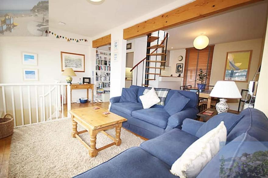 Spectacular river views. Large roof terrace. Exceptionally convenient.