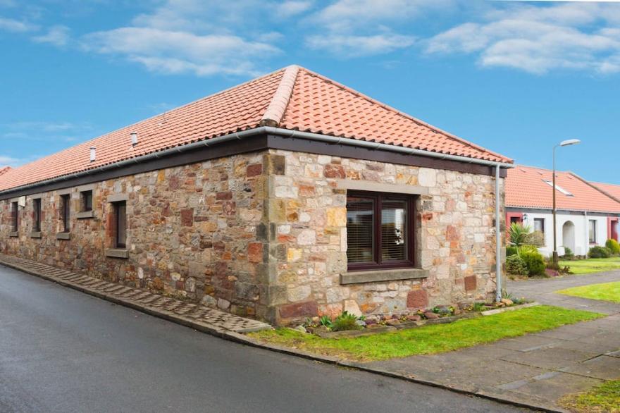 Modern, open, comfortable home within walking distance of Golf courses and beach