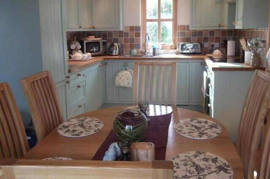 Charming property overlooking beach at Knock Bay and beyond to Knoydart
