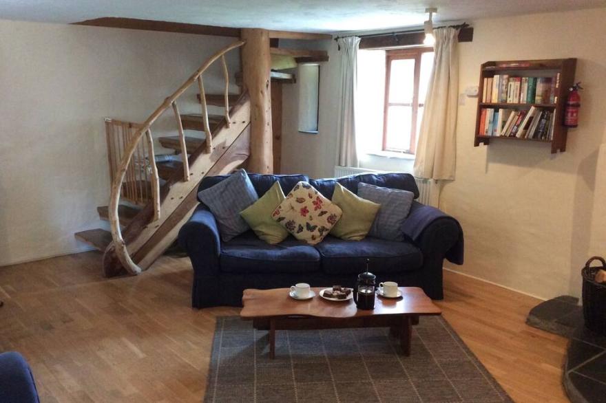 3 bedroom character cottage, wood burner, large garden, play area, sea views