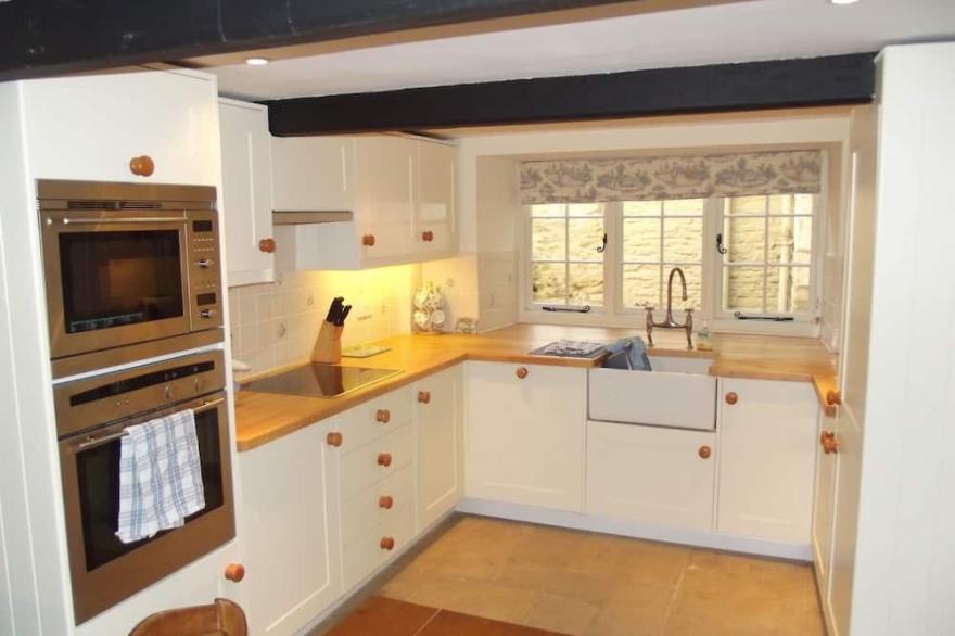 A picturesque 15th century three storey stone cottage fully equipped & furnished