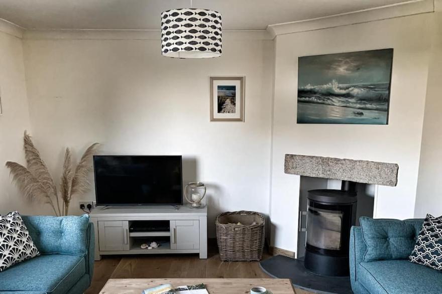 Trevince, a charming bungalow in Sennen Cove with amazing sea views.