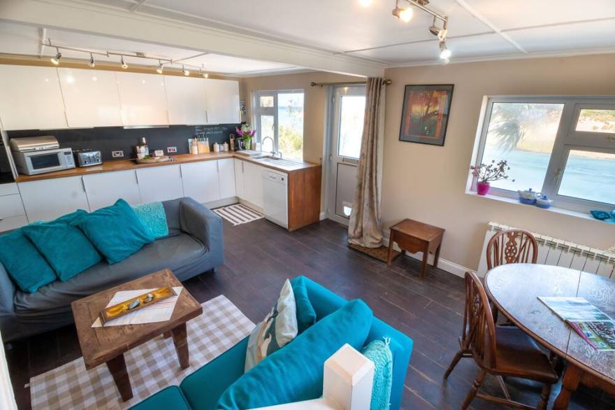 Stunning absolute sea beachfront Beach House St Ives Bay John Miller studio Wifi