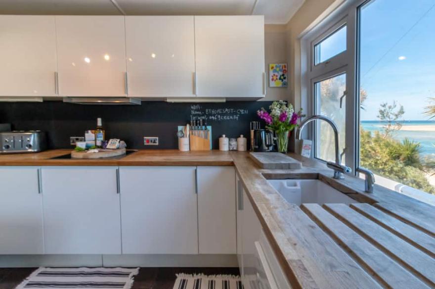 Stunning absolute sea beachfront Beach House St Ives Bay John Miller studio Wifi